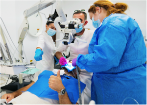 Why do we use the microscope in endodontic treatments?